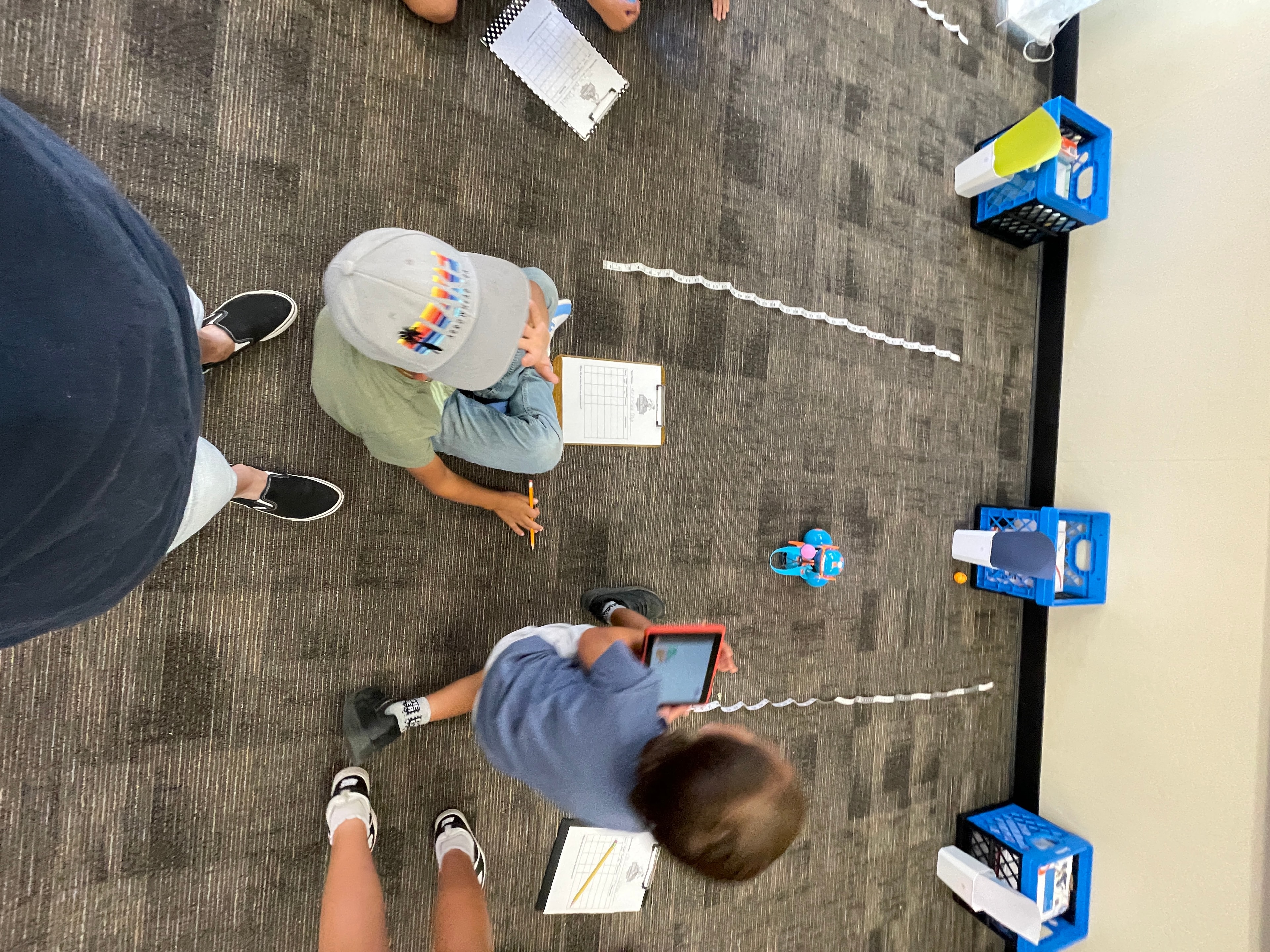 Young Americans LLC STEM educator working with students in the classroom
